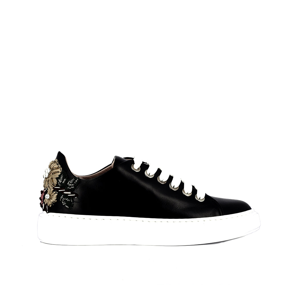 SNEAKERS con decorazione sul tallone